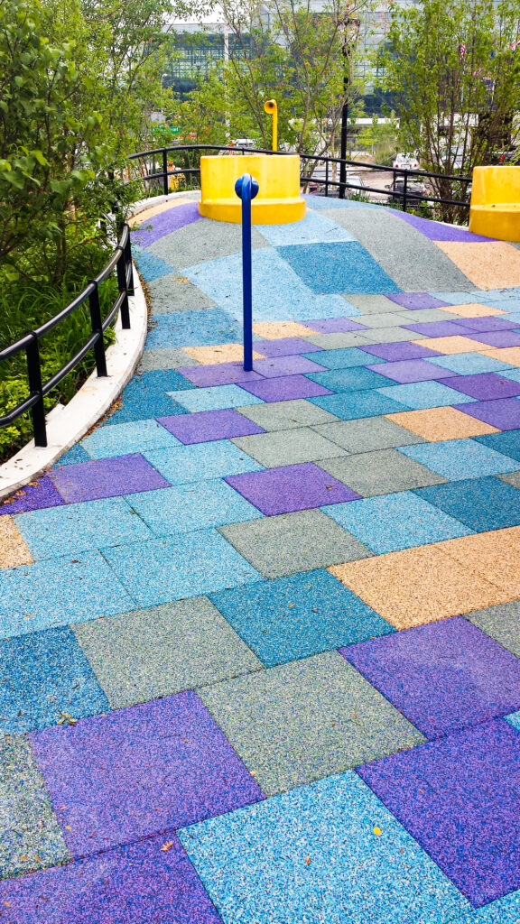 Colorful EPDM tiles on a slope in Hudson Park New York.