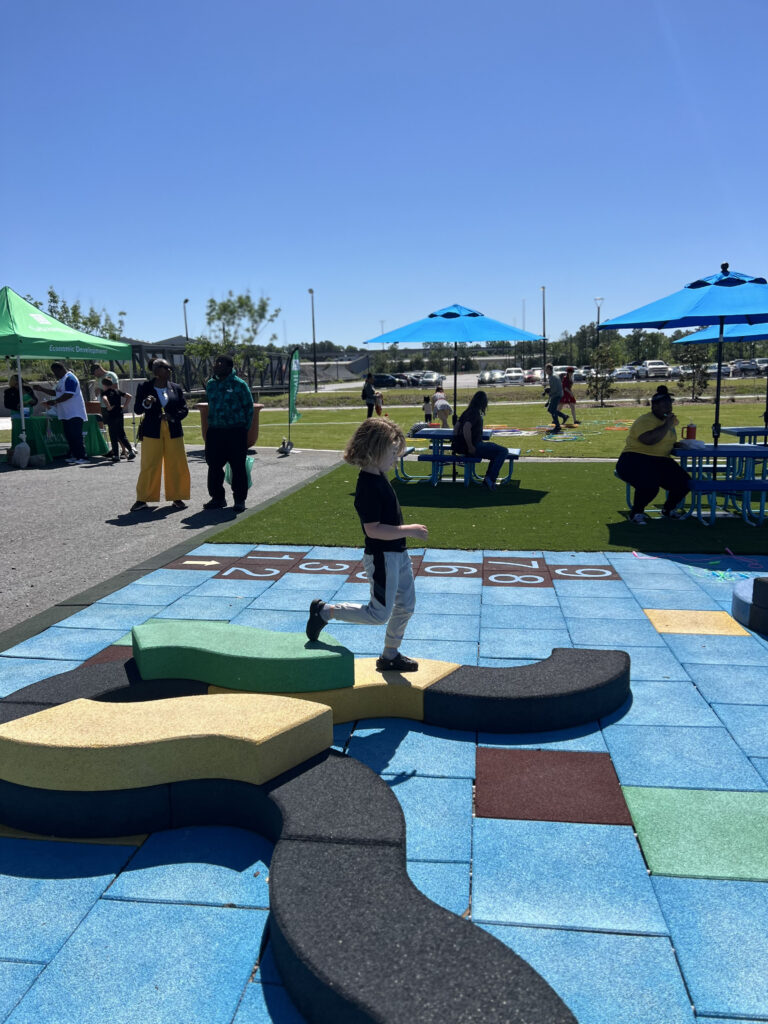 Young boy jumping across Goric's EPDM rubber accessories curvy blocks